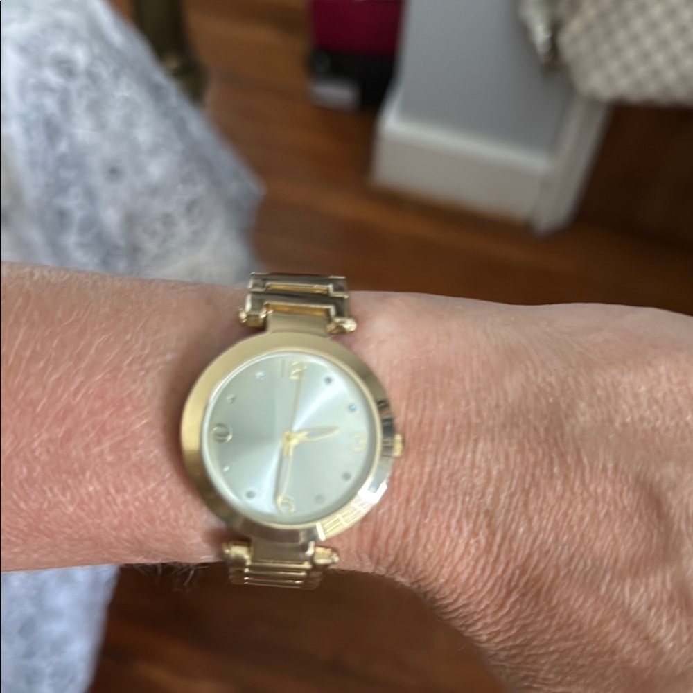 Gold Watch with White Face